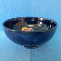 A Moorcroft Footed Bowl in the Orchid Design by Walter Moorcroft