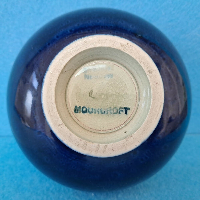 A Moorcroft Footed Bowl in the Orchid Design by Walter Moorcroft