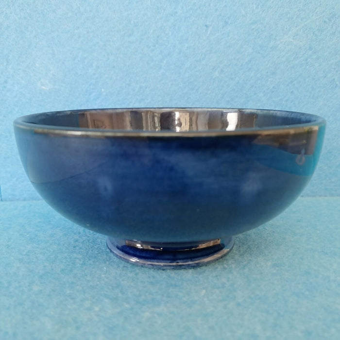 A Moorcroft Footed Bowl in the Orchid Design by Walter Moorcroft