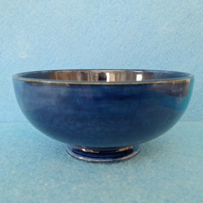 A Moorcroft Footed Bowl in the Orchid Design by Walter Moorcroft