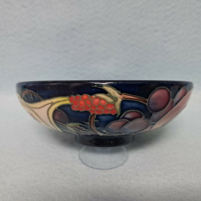 A Moorcroft Footed Bowl in the Queen's Choice Design by Emma Bossons
