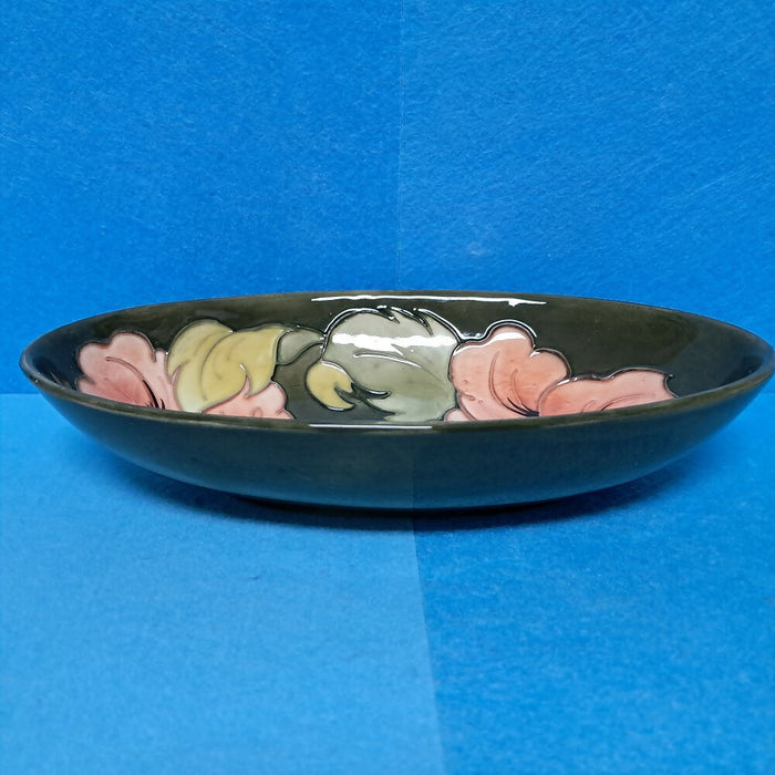 A Moorcroft Oval Bowl in the Coral Hibiscus Design by Walter Moorcroft