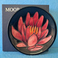 A Moorcroft Pin Dish in the May Lily Design by Emma Bossons