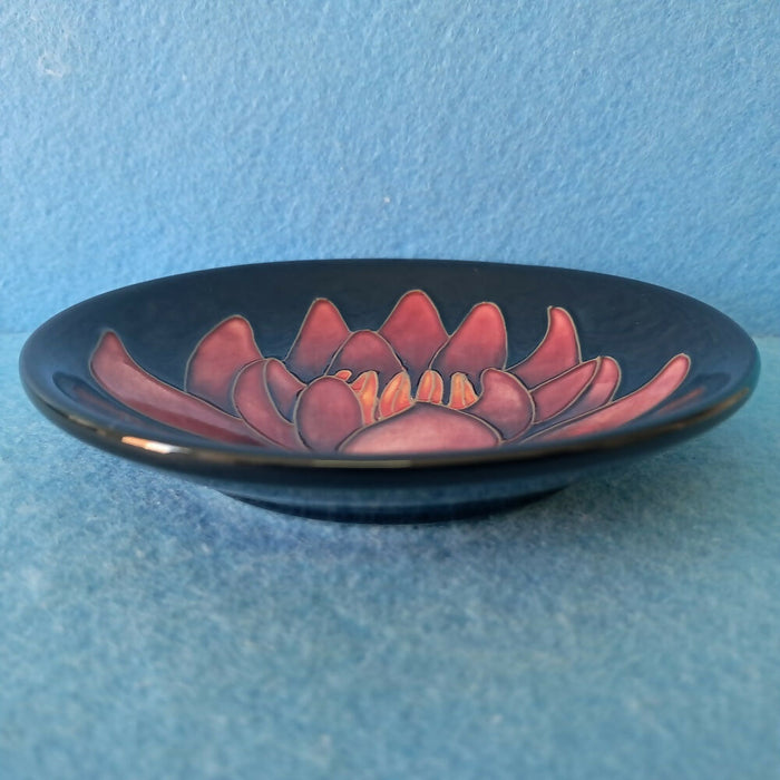 A Moorcroft Pin Dish in the May Lily Design by Emma Bossons