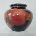 A Moorcroft Vase c1918-1926 in the Pomegranate Design by William Moorcroft