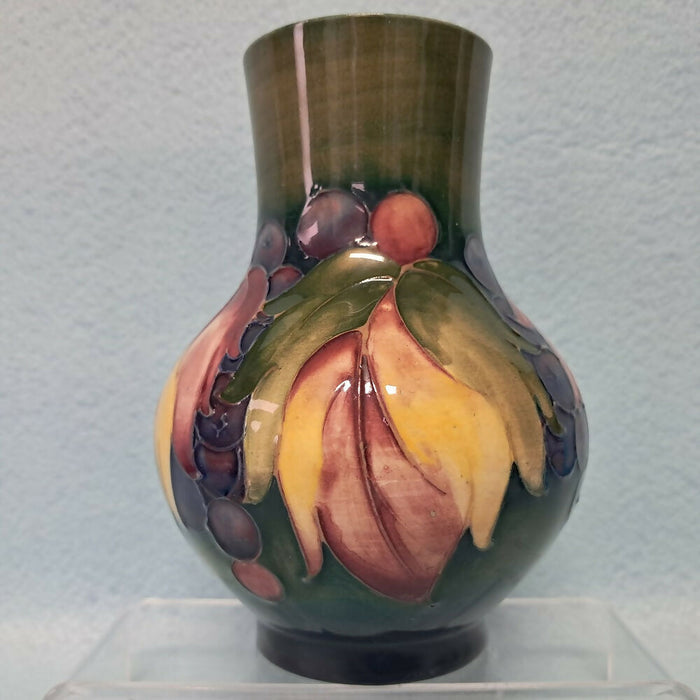 A Moorcroft Vase in the Leaf and Berry Design by William Moorcroft