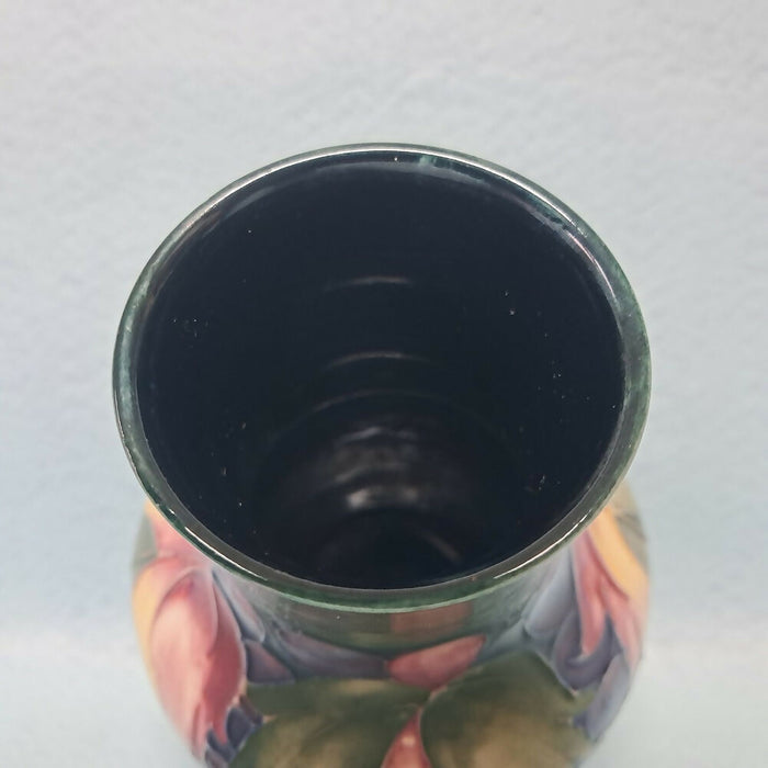 A Moorcroft Vase in the Leaf and Berry Design by William Moorcroft