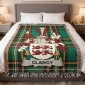 Clancy family crest woven blanket laid across a bed.