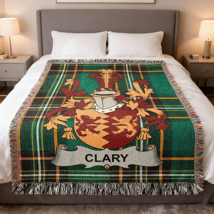 Clary family crest woven blanket laid over a bed.