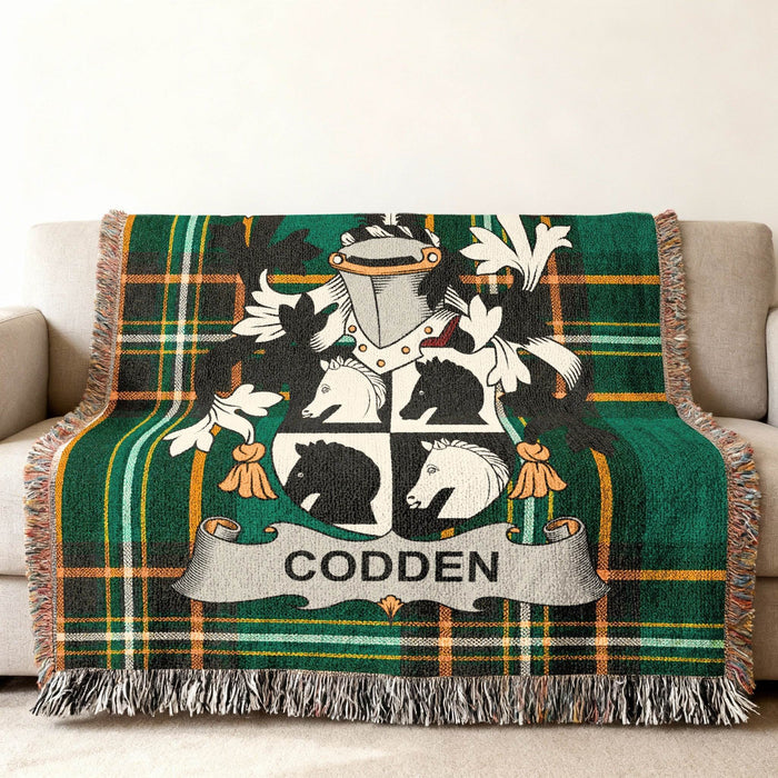 Close-up of Codden surname emblem woven into a 100% cotton Irish National Tartan blanket
