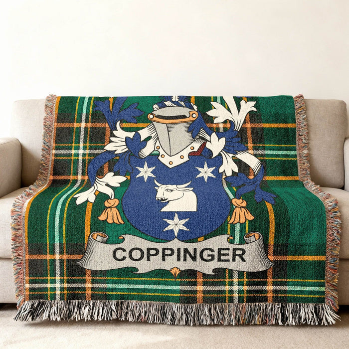Coppinger crest woven into an Irish National Tartan throw.
