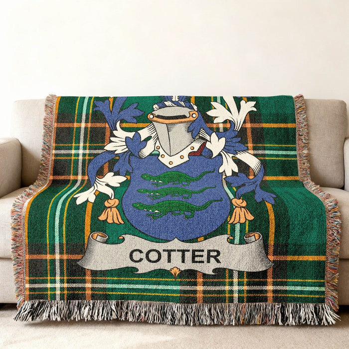 Cotter crest woven into an Irish National Tartan cotton throw.