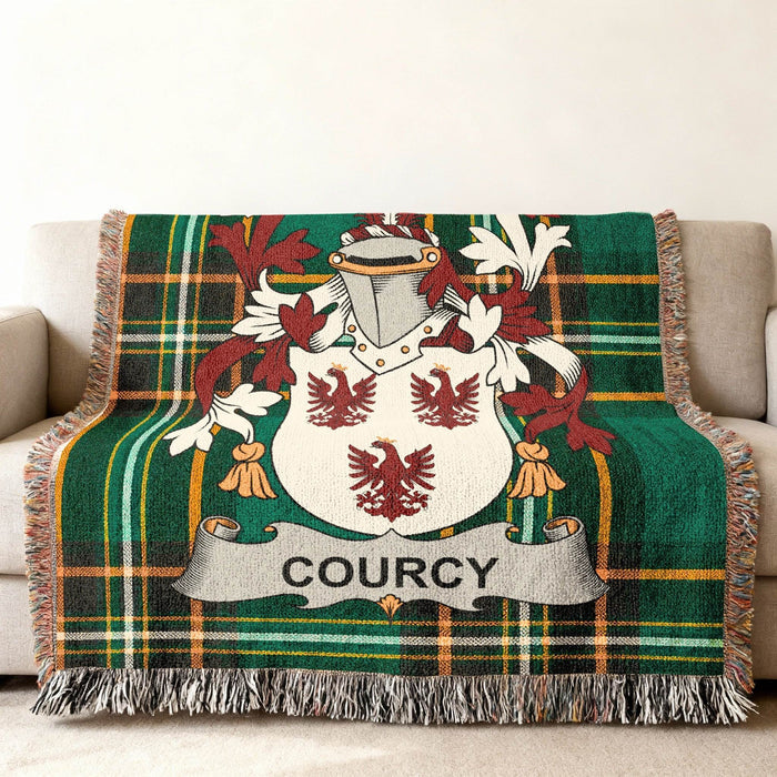 Courcy crest woven through an Irish National Tartan cotton throw.