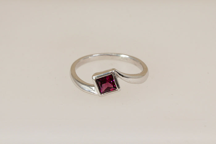 Elegant Sterling Silver Rhodolite Garnet Twist Ring