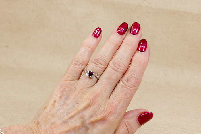 Elegant Sterling Silver Rhodolite Garnet Twist Ring