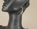 Elegant Sterling Silver & Topaz Drop Earrings by Kit Heath