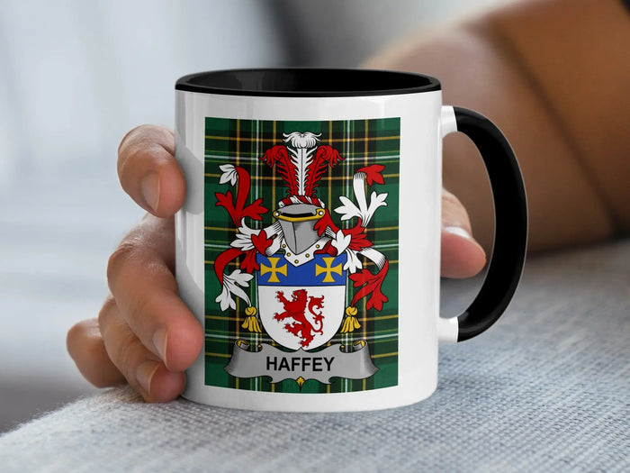 White mug with black rim displaying a coat of arms and the name HAFFEY.