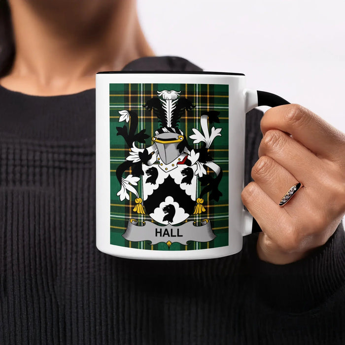 White mug with black handle displaying a family crest with the name "HALL".