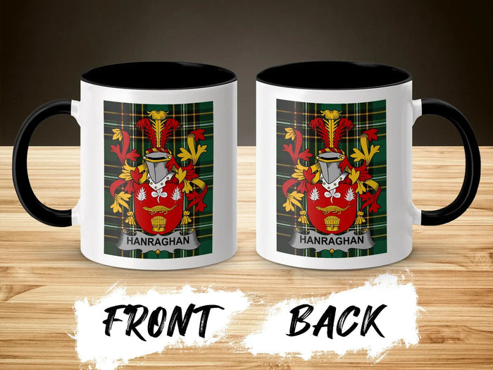 White mug with black rim and handle, displaying a red coat of arms with "HANRAGHAN" text.