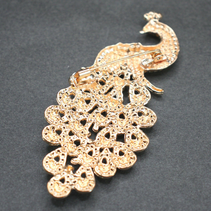 Peacock brooch